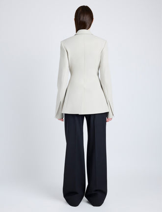 Proenza Schouler Back full length image of model wearing Lark Blazer in Wool Gabardine Suiting in TAUPE