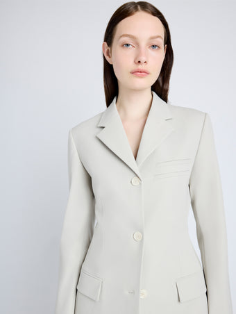 Proenza Schouler Detail image of model wearing Lark Blazer in Wool Gabardine Suiting in TAUPE