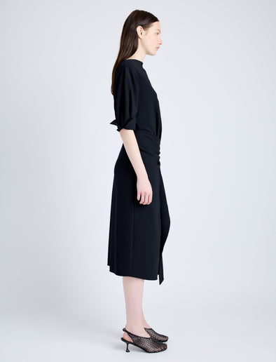 Proenza Schouler Side full length image of model wearing Maisie Dress in Matte Viscose Crepe in BLACK