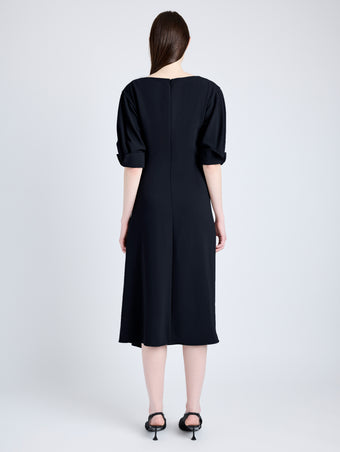 Proenza Schouler Back full length image of model wearing Maisie Dress in Matte Viscose Crepe in BLACK