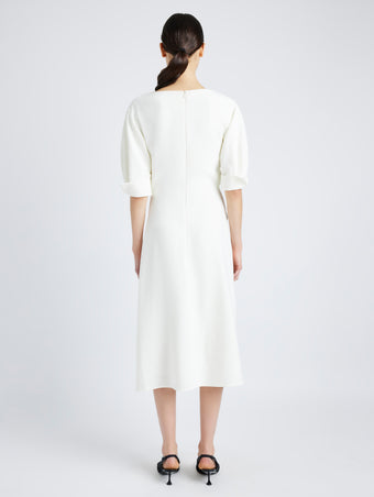 Proenza Schouler Back full length image of model wearing Maisie Dress in Matte Viscose Crepe in IVORY