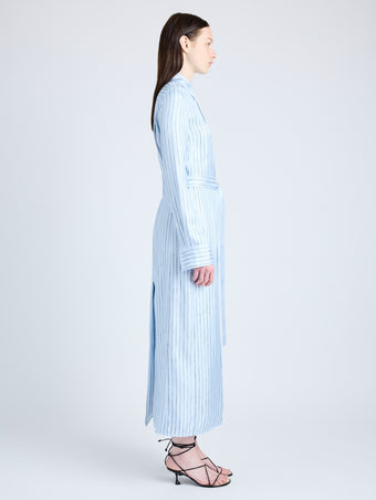 Proenza Schouler Side full length image of model wearing Hannah Dress in Stripe Silk Twill in PALE BLUE MULTI