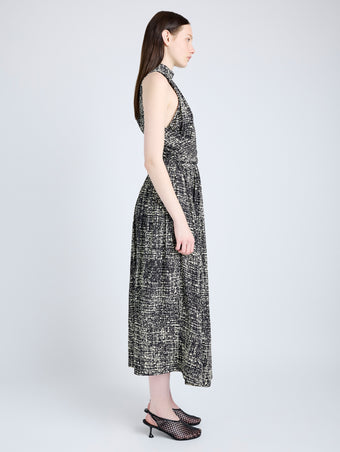 Proenza Schouler Side full length image of model wearing Lola Dress in Printed Viscose Crepe in BLACK MULTI