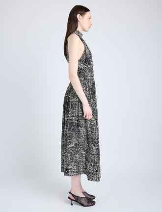 Proenza Schouler Side full length image of model wearing Lola Dress in Printed Viscose Crepe in BLACK MULTI
