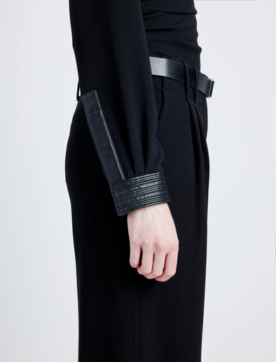 Proenza Schouler Detail image of model wearing Alexis Top in Matte Viscose Crepe with Faux Leathe in BLACK