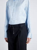 Proenza Schouler detail image of model wearing Madison Top in Stripe Silk Twill in pale blue multi
