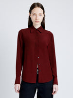 Proenza Schouler cropped front image of model wearing Arabella Top in Eco Silk in OX BLOOD