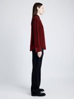 Proenza Schouler side image of model wearing Arabella Top in Eco Silk in OX BLOOD