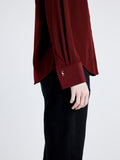 Proenza Schouler detail image of model wearing Arabella Top in Eco Silk in OX BLOOD