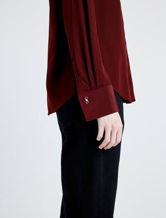 Proenza Schouler detail image of model wearing Arabella Top in Eco Silk in OX BLOOD