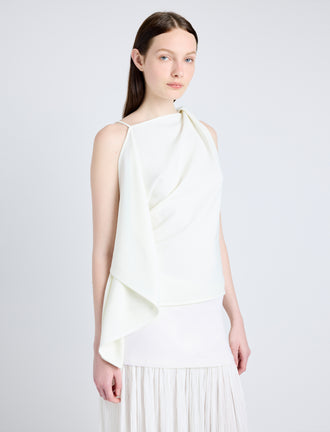 Proenza Schouler Detail image of model wearing Paige Skirt in Pleated Crepe Chiffon in IVORY