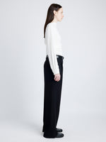 Proenza Schouler Side full length image of model wearing Uma Pants in Melange Twill Suiting in BLACK