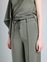 Proenza Schouler Detail image of model wearing Weyes Pant in Matte Viscose Crepe in WOOD