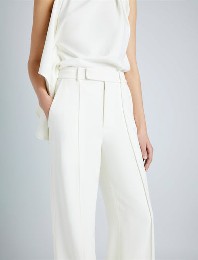 Proenza Schouler Detail image of model wearing Weyes Pant in Matte Viscose Crepe in IVORY