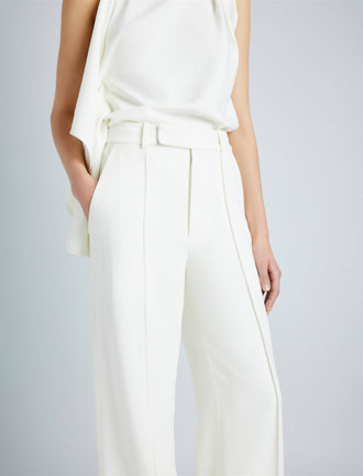 Proenza Schouler Detail image of model wearing Weyes Pant in Matte Viscose Crepe in IVORY
