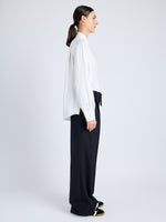 Proenza Schouler Side full length image of model wearing Savannah Pant in Wool Gabardine Suiting in BLACK