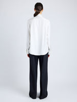 Proenza Schouler Back full length image of model wearing Savannah Pant in Wool Gabardine Suiting in BLACK
