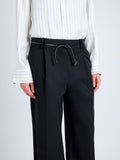 Proenza Schouler Detail image of model wearing Savannah Pant in Wool Gabardine Suiting in BLACK