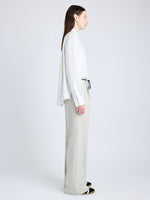 Proenza Schouler Side full length image of model wearing Savannah Pant in Wool Gabardine Suiting in TAUPE