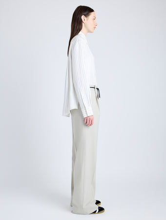 Proenza Schouler Side full length image of model wearing Savannah Pant in Wool Gabardine Suiting in TAUPE