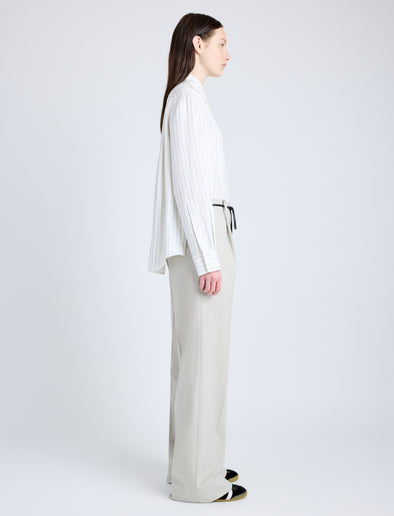 Proenza Schouler Side full length image of model wearing Savannah Pant in Wool Gabardine Suiting in TAUPE