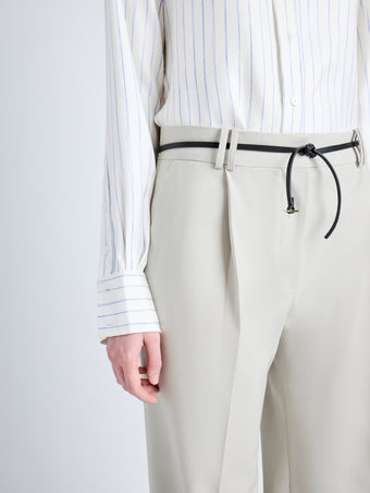 Proenza Schouler Detail image of model wearing Savannah Pant in Wool Gabardine Suiting in TAUPE