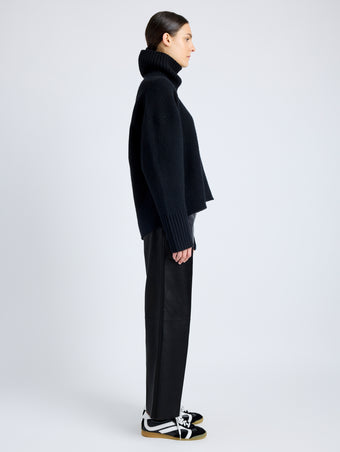 Proenza Schouler Side full length image of model wearing Noland Pant in Leather in BLACK