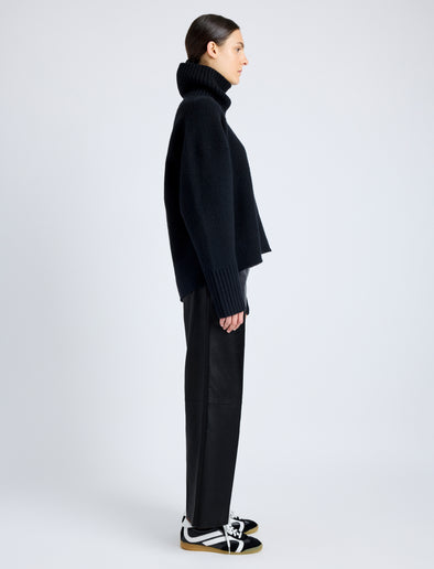 Proenza Schouler Side full length image of model wearing Noland Pant in Leather in BLACK