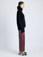 Proenza Schouler Side full length image of model wearing Noland Pant in Leather in OX BLOOD