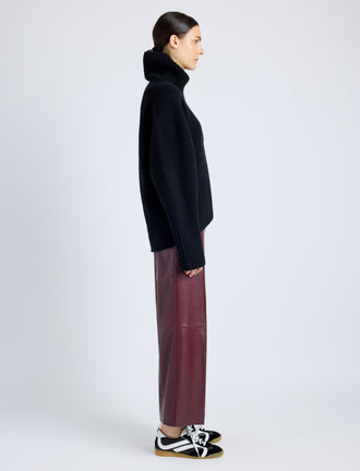 Proenza Schouler Side full length image of model wearing Noland Pant in Leather in OX BLOOD
