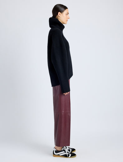 Proenza Schouler Side full length image of model wearing Noland Pant in Leather in OX BLOOD
