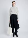 Proenza Schouler Front full length image of model wearing Greta Sweater in Lofty Eco Cashmere in LIGHT GREY MELANGE
