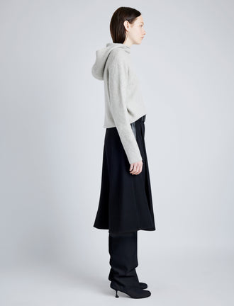 Proenza Schouler Side full length image of model wearing Greta Sweater in Lofty Eco Cashmere in LIGHT GREY MELANGE
