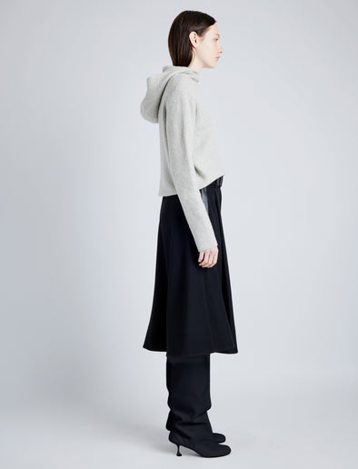 Proenza Schouler Side full length image of model wearing Greta Sweater in Lofty Eco Cashmere in LIGHT GREY MELANGE