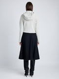 Proenza Schouler Back full length image of model wearing Greta Sweater in Lofty Eco Cashmere in LIGHT GREY MELANGE