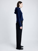 Proenza Schouler Side full length image of model wearing Greta Sweater in Lofty Eco Cashmere in NAVY