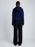 Proenza Schouler Back full length image of model wearing Greta Sweater in Lofty Eco Cashmere in NAVY