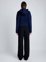 Proenza Schouler Back full length image of model wearing Greta Sweater in Lofty Eco Cashmere in NAVY