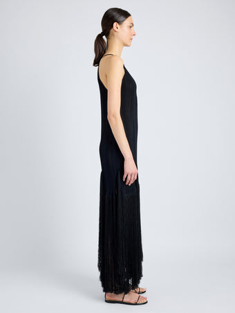 Proenza Schouler Side full length image of model wearing Everly Dress in Vicose Fringe Knit in BLACK