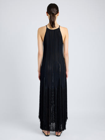 Proenza Schouler Back full length image of model wearing Everly Dress in Vicose Fringe Knit in BLACK