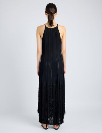 Proenza Schouler Back full length image of model wearing Everly Dress in Vicose Fringe Knit in BLACK