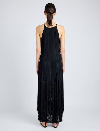 Proenza Schouler Back full length image of model wearing Everly Dress in Vicose Fringe Knit in BLACK