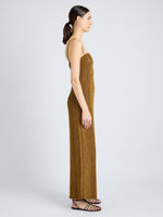 Proenza Schouler Side full length image of model wearing Suki Dress in Viscose Ribbon Knit in OCHRE