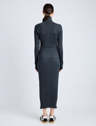 Proenza Schouler Back full length image of model wearing Maeve Dress in Superfine Merino Silk in CHARCOAL