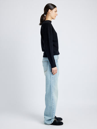 Proenza Schouler side image of model wearing Ellsworth Jean in CLASSIC WASH