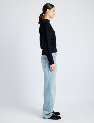Proenza Schouler side image of model wearing Ellsworth Jean in CLASSIC WASH