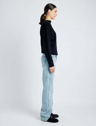 Proenza Schouler side image of model wearing Ryman Jean in CLASSIC WASH