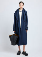 Proenza Schouler Front full length image of model wearing Sabina Coat in Technical Nylon Jacquard in Midnight
