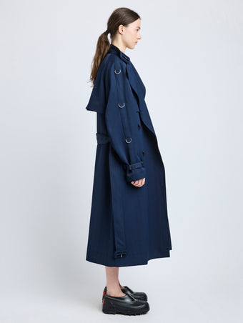Proenza Schouler Side full length image of model wearing Sabina Coat in Technical Nylon Jacquard in Midnight