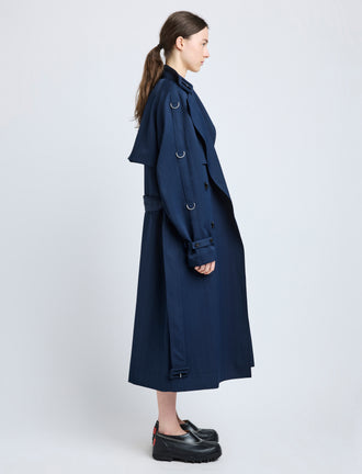 Proenza Schouler Side full length image of model wearing Sabina Coat in Technical Nylon Jacquard in Midnight